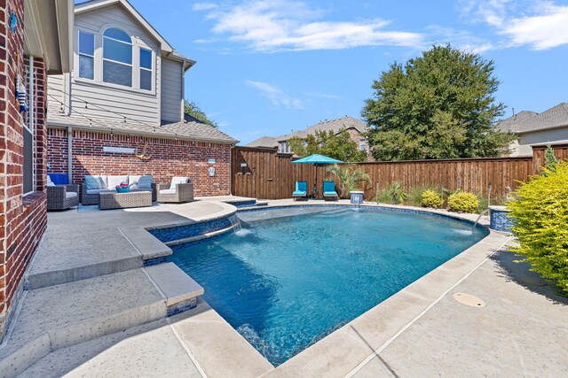 view of swimming pool with an outdoor living space, pool water feature, a patio area, and central air condition unit