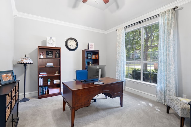 home office featuring light carpet, a wealth of natural light, and crown molding