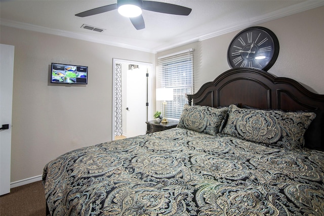 bedroom featuring ceiling fan, crown molding, and carpet floors