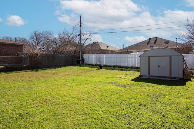 view of yard with a storage shed