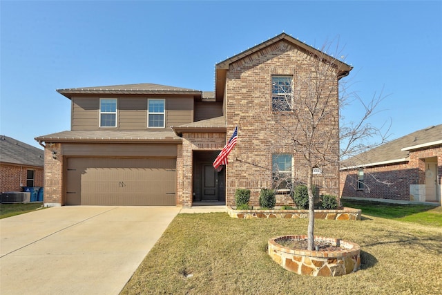 view of front of property with a garage, a front yard, and central air condition unit