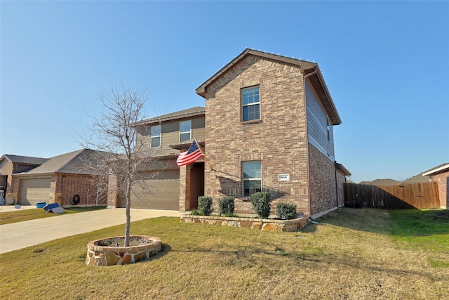 view of property with a garage and a front lawn