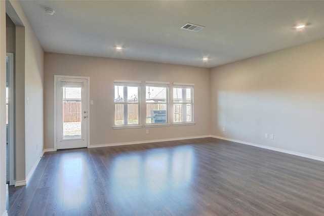 empty room featuring dark hardwood / wood-style floors