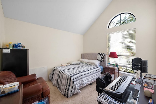 bedroom with light carpet and vaulted ceiling