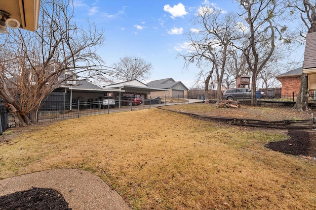 view of yard with a carport