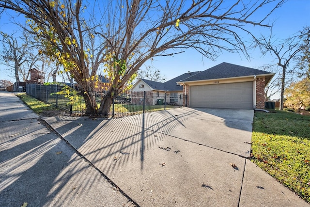 single story home with central AC unit, a garage, and a front lawn