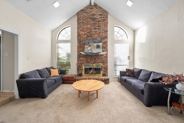 living room with vaulted ceiling with beams, a fireplace, and light carpet