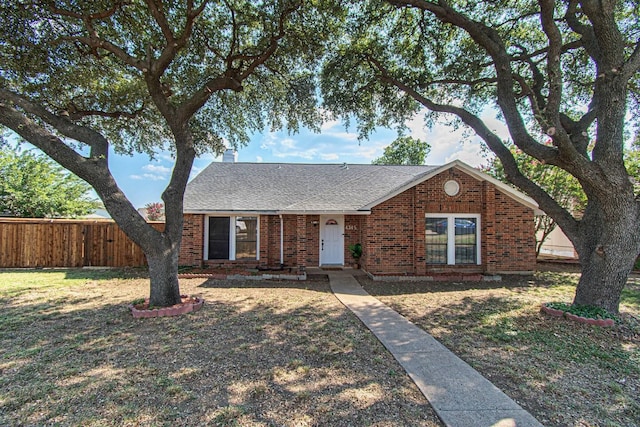 ranch-style house with a front yard