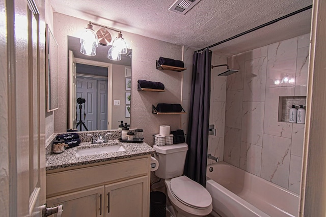 full bathroom featuring vanity, shower / tub combo, a textured ceiling, and toilet