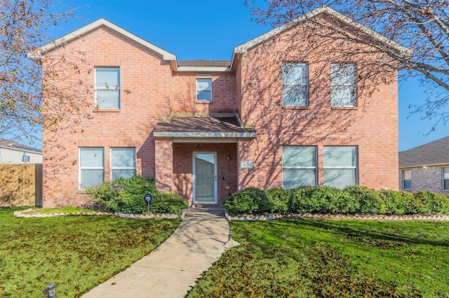 view of front of home with a front yard