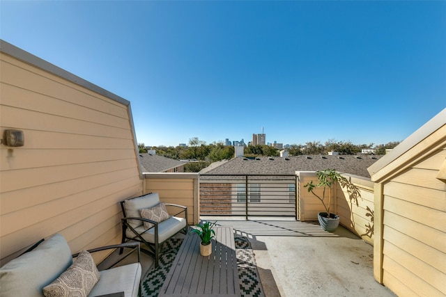 view of patio / terrace with a balcony