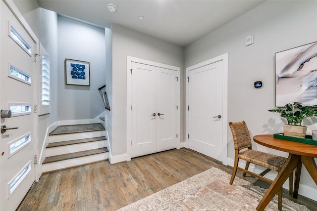 foyer entrance featuring hardwood / wood-style floors