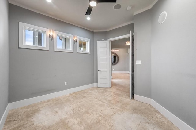 unfurnished bedroom with crown molding, baseboards, and ceiling fan