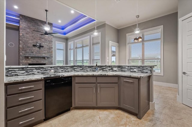 kitchen with a ceiling fan, a sink, black dishwasher, and gray cabinets