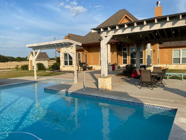 view of pool with a patio area