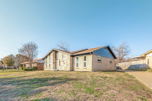 exterior space with a lawn