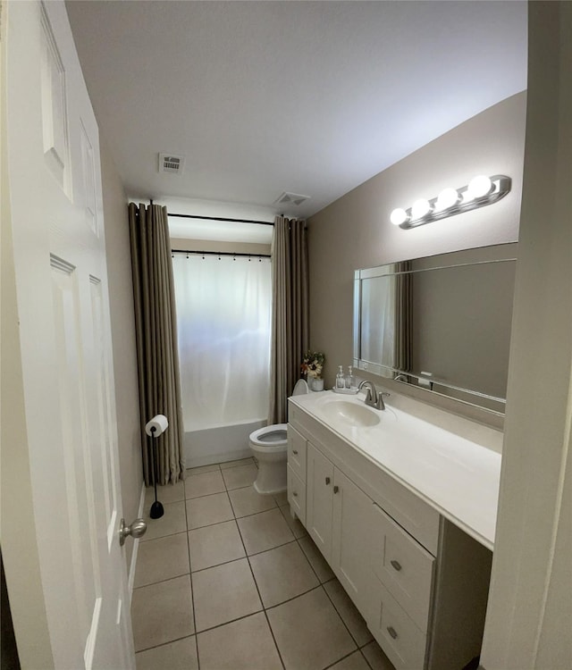 full bathroom featuring tile patterned flooring, vanity, toilet, and tub / shower combination