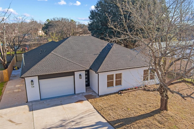 view of front of home with a garage