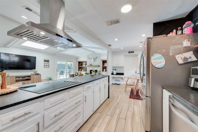 kitchen with dishwasher, sink, and white cabinets