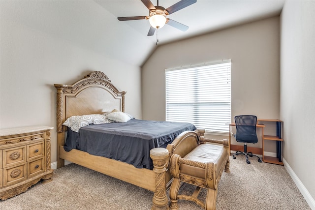 carpeted bedroom featuring ceiling fan and vaulted ceiling