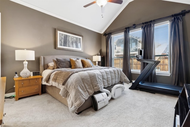 bedroom featuring vaulted ceiling, ceiling fan, ornamental molding, and light carpet