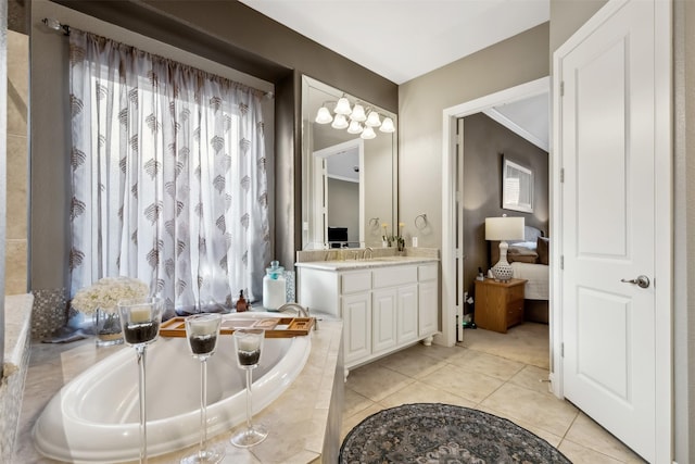 bathroom featuring ornamental molding, tile patterned floors, tiled tub, and vanity