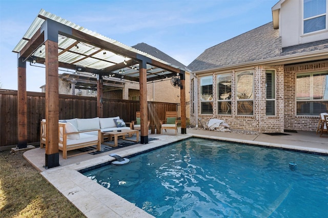 view of swimming pool featuring an outdoor living space and a patio