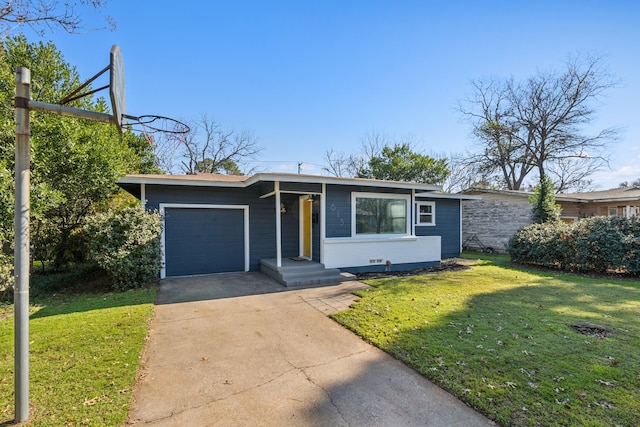 ranch-style house with a garage and a front yard