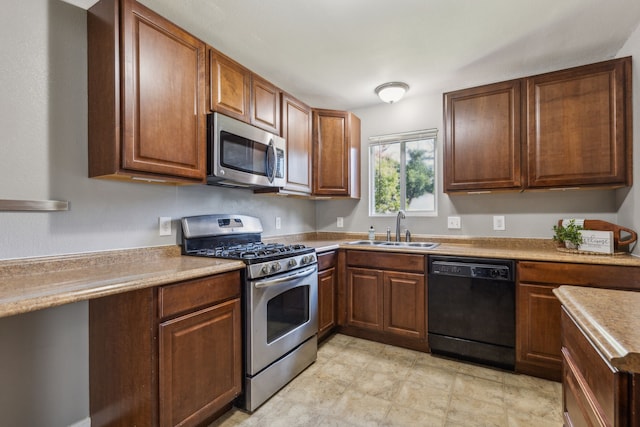 kitchen featuring sink and appliances with stainless steel finishes