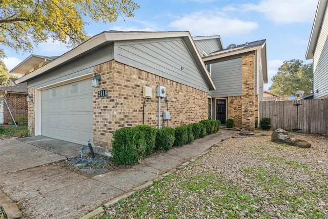 view of property exterior featuring a garage