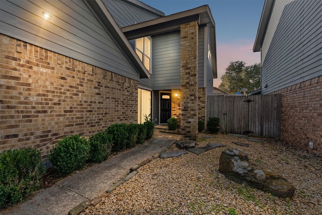 view of property exterior at dusk