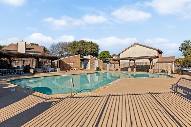 view of pool featuring a gazebo and a patio area