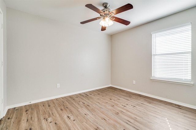 unfurnished room featuring ceiling fan, a healthy amount of sunlight, and light hardwood / wood-style floors