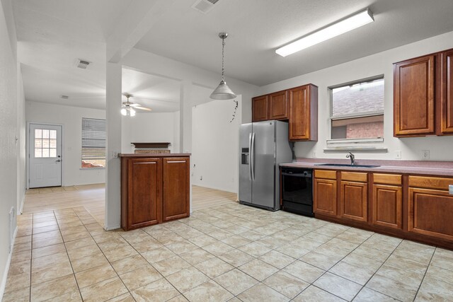 kitchen featuring sink, stainless steel fridge with ice dispenser, hanging light fixtures, dishwasher, and ceiling fan