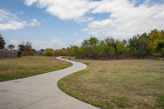 surrounding community with a lawn