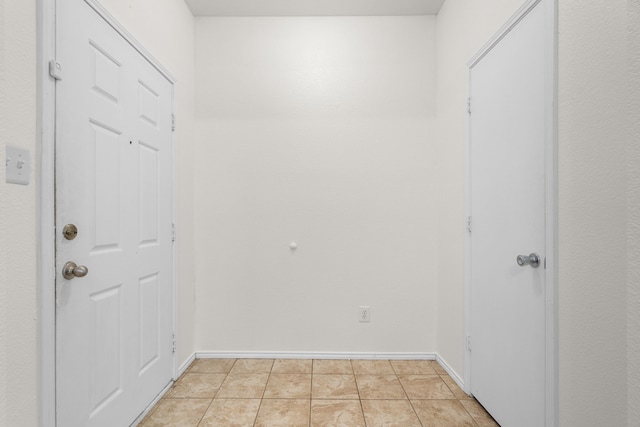 interior space with light tile patterned floors