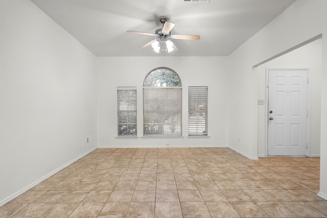 spare room with ceiling fan