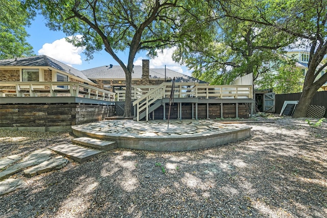 view of yard with a wooden deck