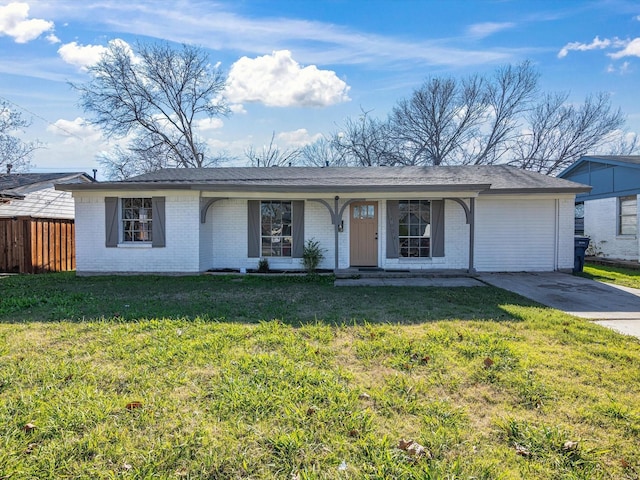 ranch-style home featuring a porch, a garage, and a front yard