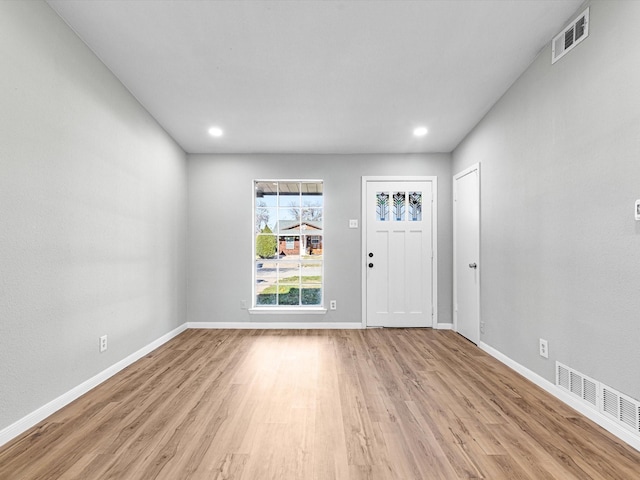 foyer entrance featuring light wood-type flooring