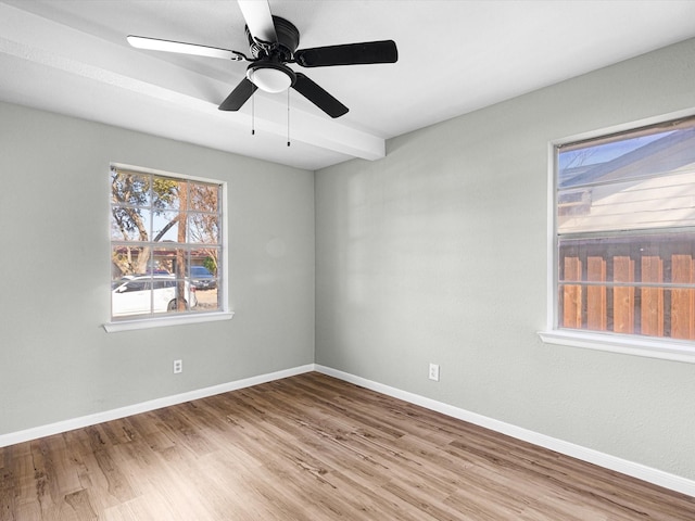 unfurnished room featuring light wood-type flooring and ceiling fan