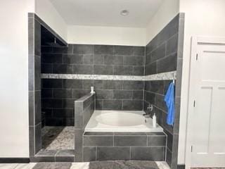 bathroom with independent shower and bath