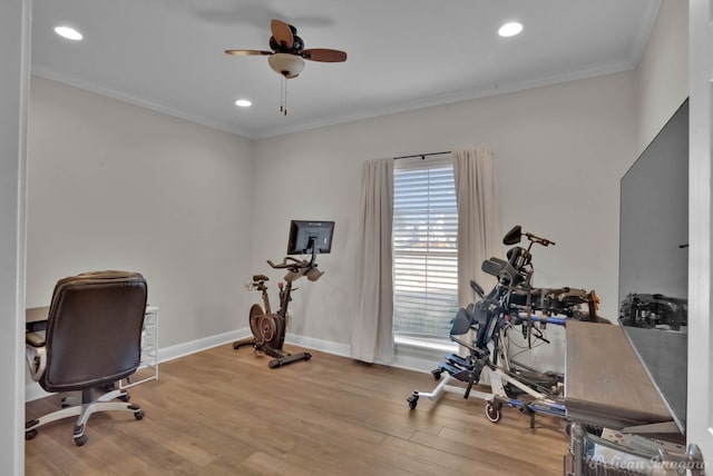 home office featuring ornamental molding, hardwood / wood-style floors, and ceiling fan