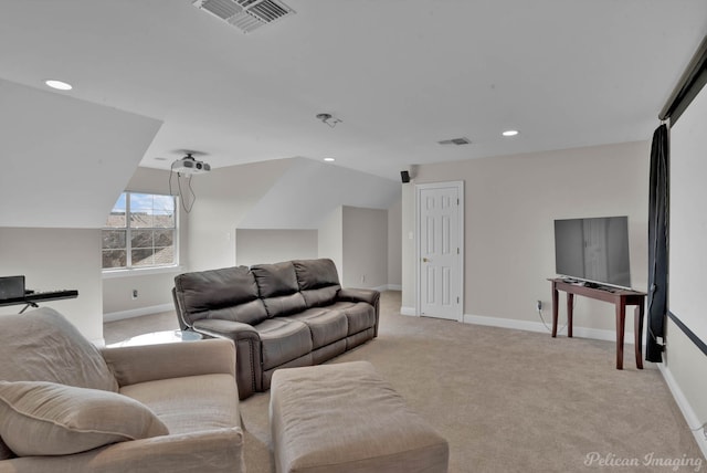 living room featuring lofted ceiling and light carpet