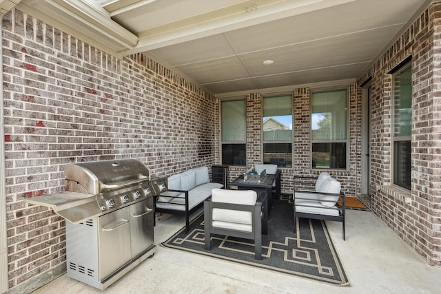 view of patio / terrace with outdoor lounge area and grilling area