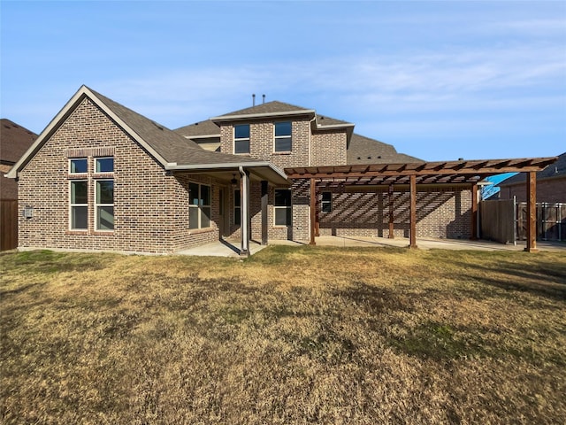 back of property featuring a pergola, a lawn, and a patio