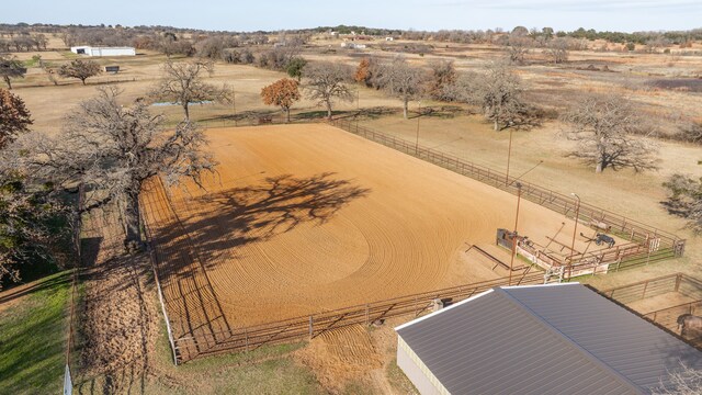 birds eye view of property featuring a rural view