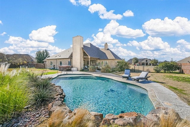 view of swimming pool featuring a patio