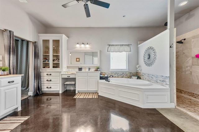 bathroom featuring ceiling fan, vanity, concrete flooring, and shower with separate bathtub