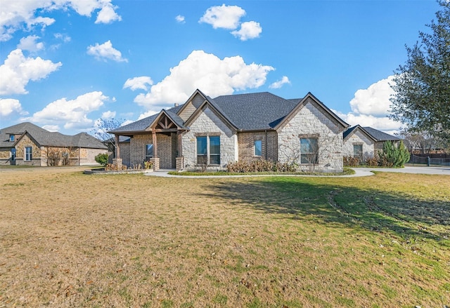 view of front of property with a front lawn